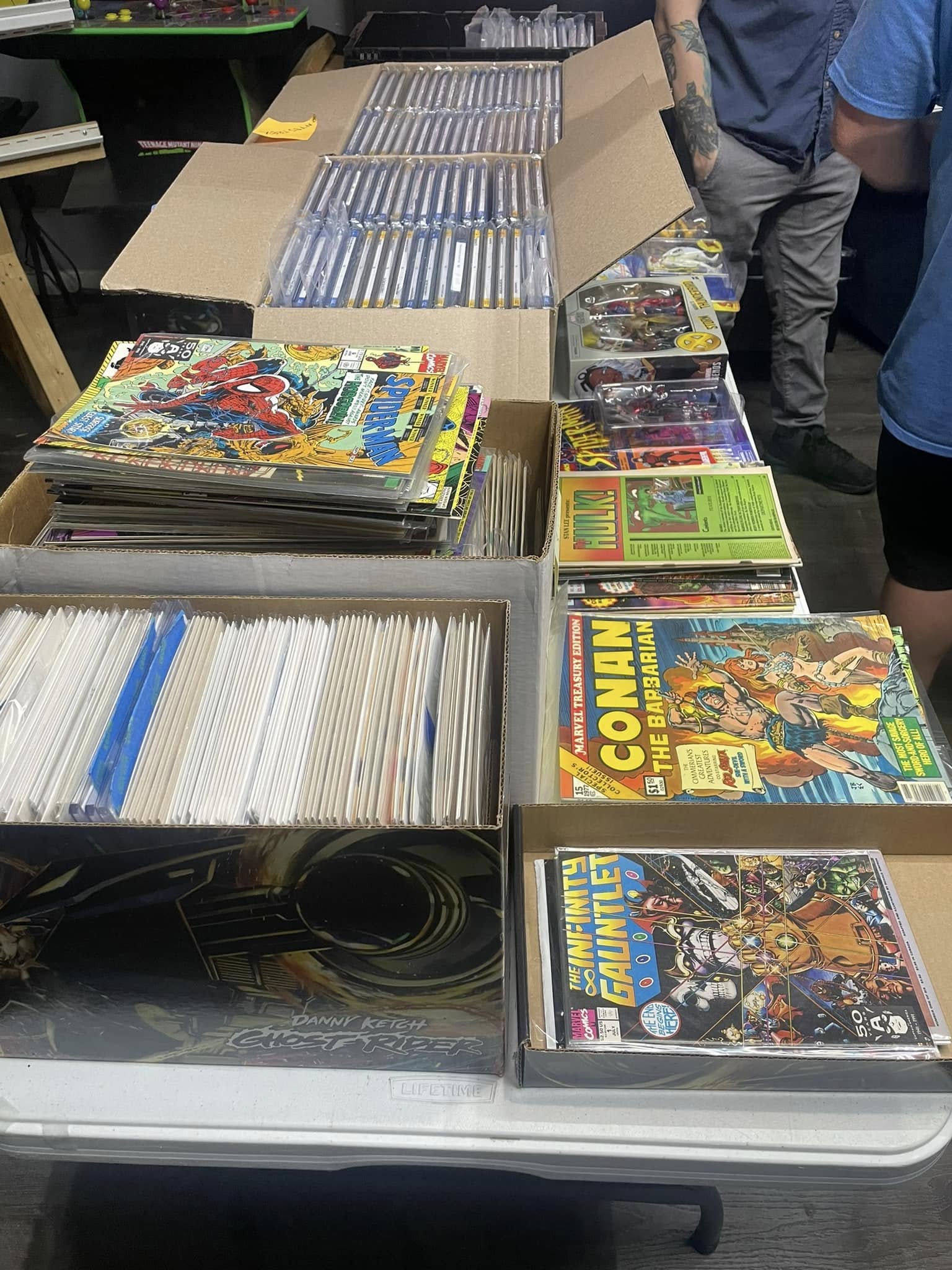 Boxes and tables filled with comic books for swapping