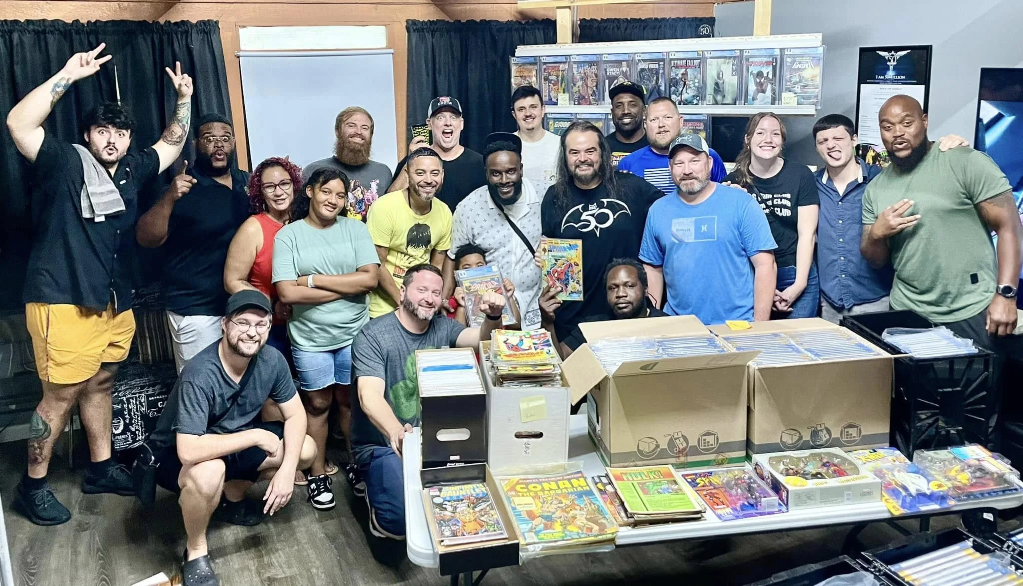 Members of the 50Million community gathered with comics at a Comic Book Swap