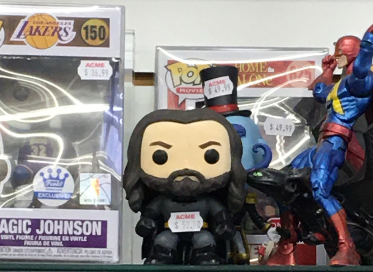 Collectible figures on display at ACME Superstore